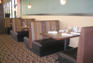 Restaurant booth interior by Ferrante Manufacturing Co. in Detroit, MI